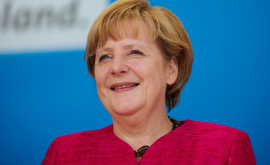 Angela Merkel surprinsă întro ipostază neobişnuită FOTO