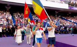 Anastasia Nichita și Serghei Tarnovschi au purtat drapelul Moldovei la ceremonia de închidere a Jocurilor Olimpice