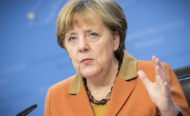 Merkel se teme că va fi pusă la colț de Trump