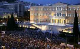 Proteste violente față de adoptarea unor noi măsuri de austeritate în Grecia